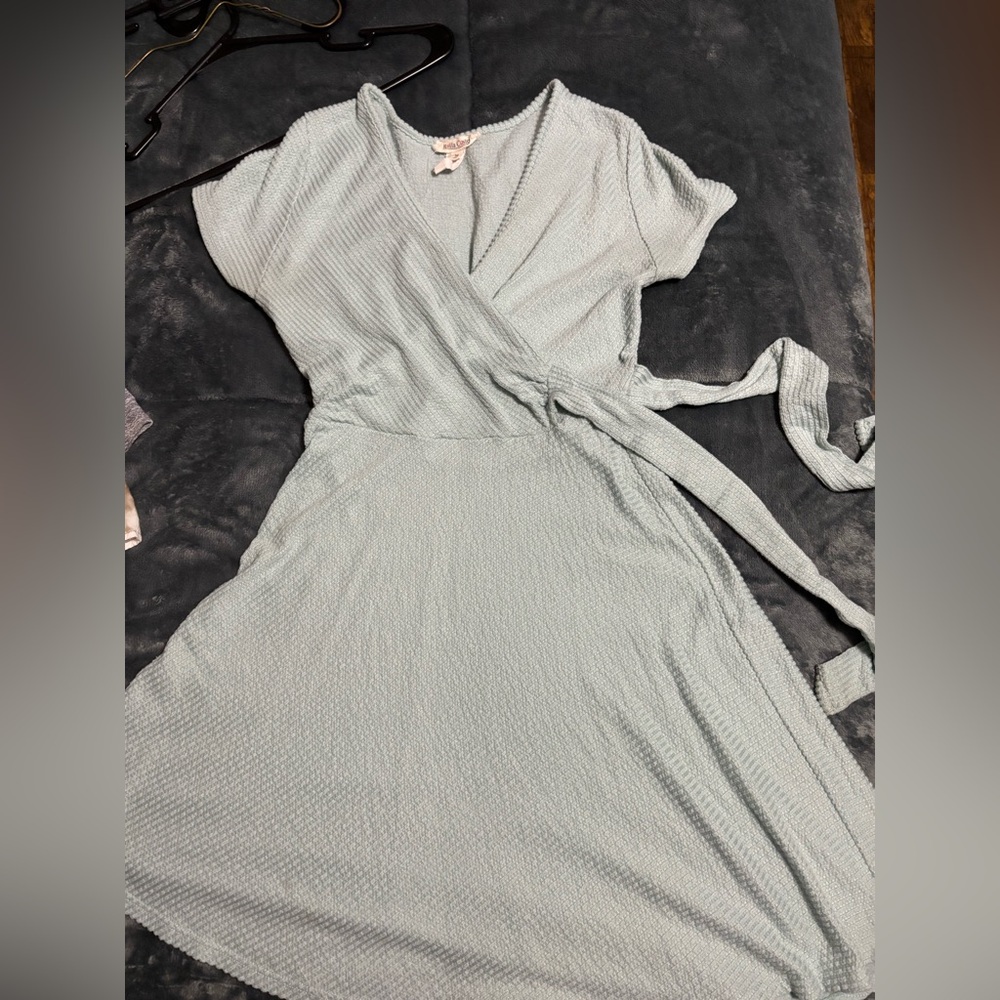 Medium sized rolla coster dress v shape neck